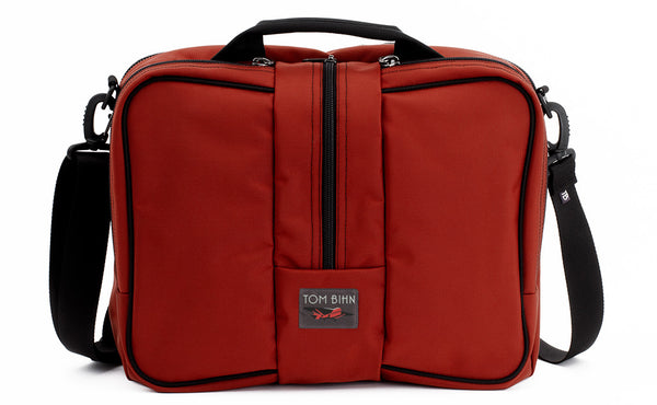 Pilot in Mars Red 525 Ballistic with Northwest Sky (light grey with white grid) 200 Halcyon interior.
